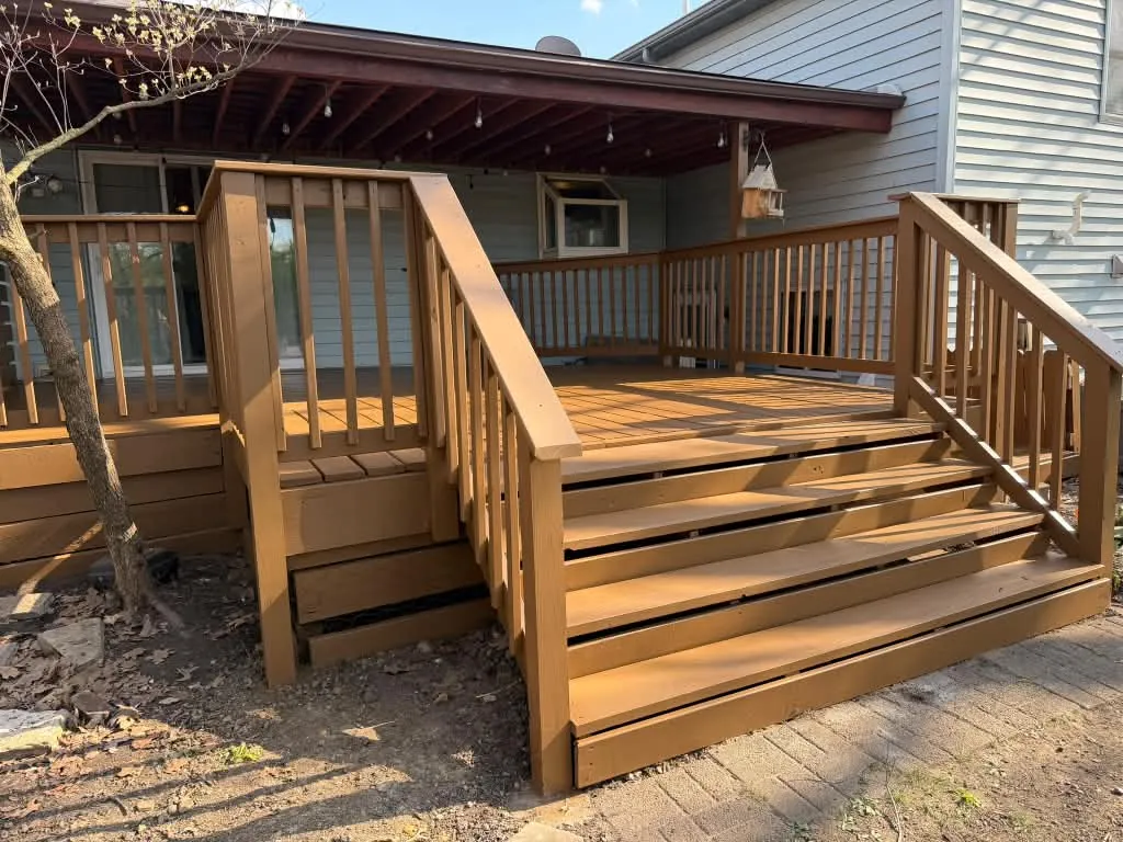 Backyard deck with new stained stairs
