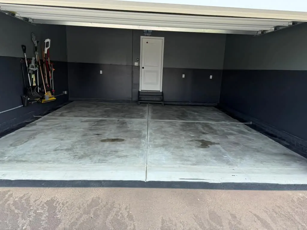 Garage with a bare concrete floor
