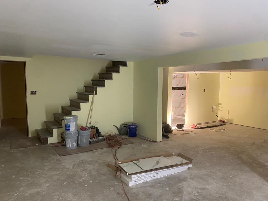 Garage before with bare concrete floor