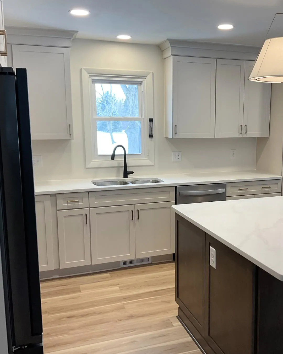 Kitchen after remodel with white cabinets