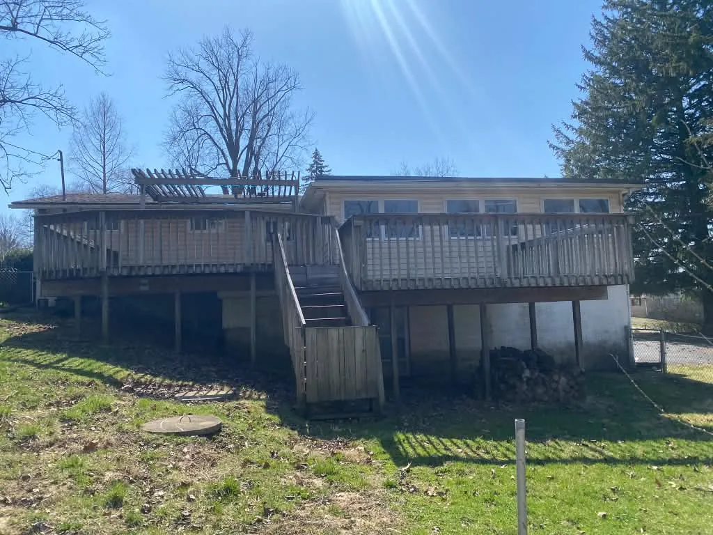 Weathered raised deck before refinishing